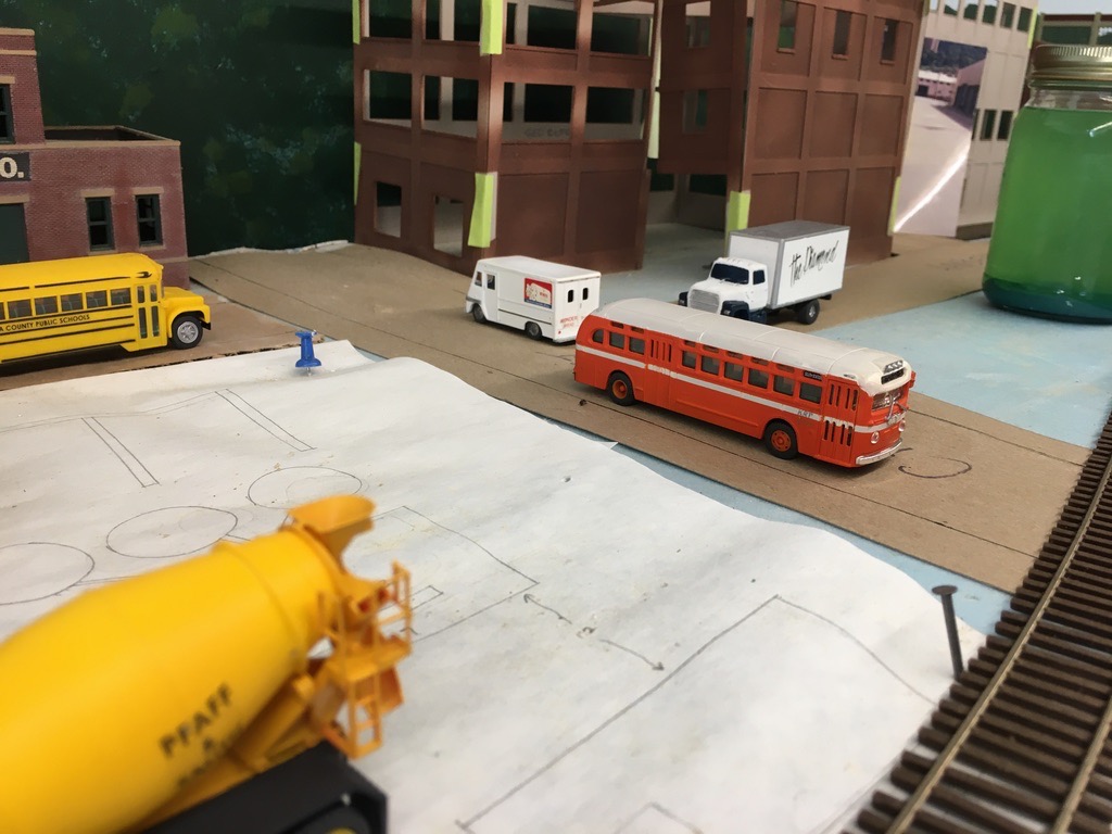 The orange and cream city bus is a Classic Metal Works GMC TDH 3610 city bus. It's been stripped and repainted for Kanawha Regional Transit as it would have looked in 1976.