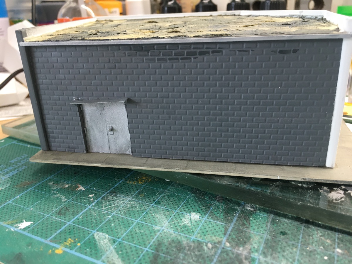 Back side of the Valley Bell Dairy store. I only had a front photo, so this is completely made up. The roof over the door has been straightened.