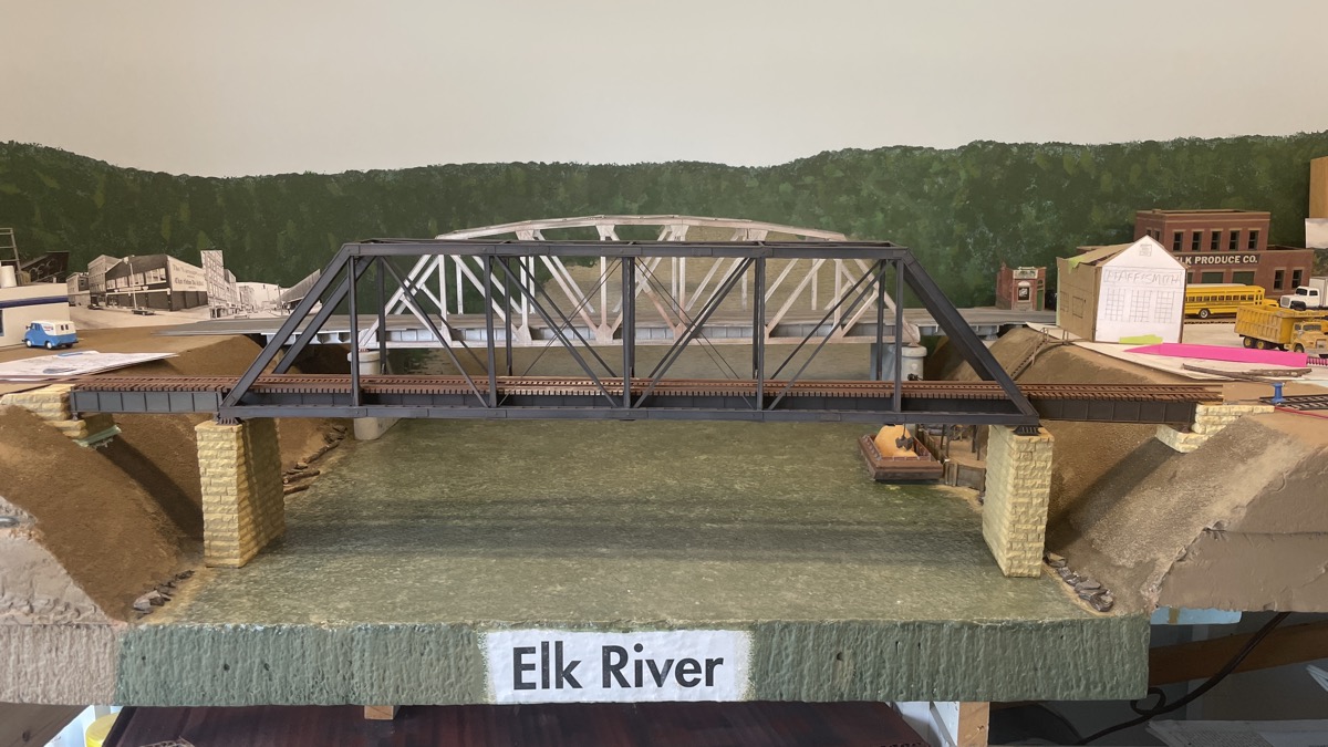 Bridge now connected to the river bank.