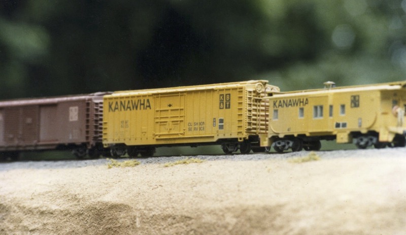 Three KB&T cars bring up the rear of a train.
