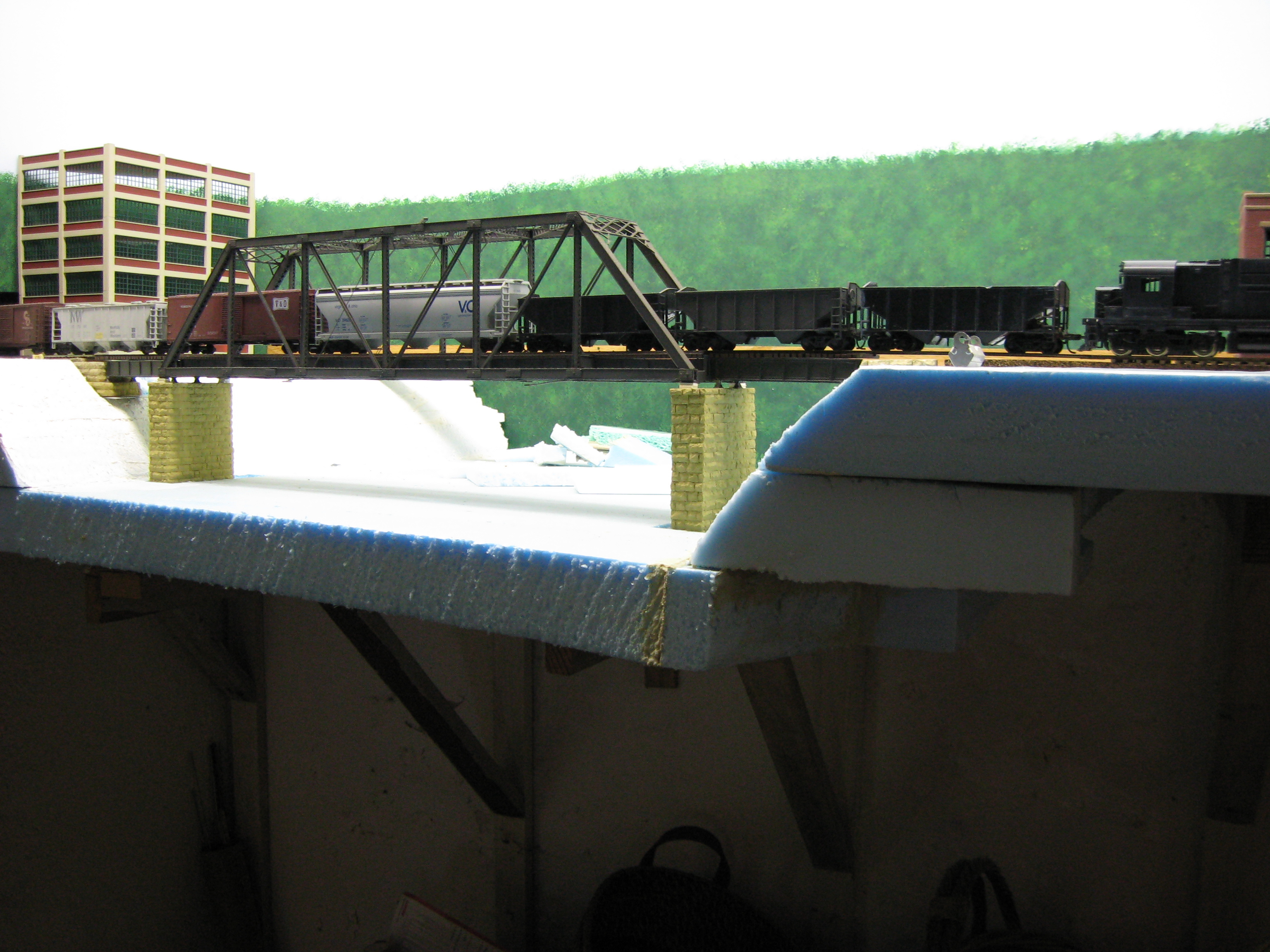 A KB&T mixed freight crossing the Elk River as it enters Charleston, WV.