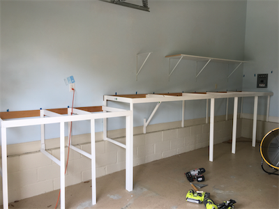 Benchwork continues. Change in elevation is where a river will be located.