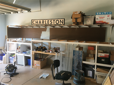 Masonite backdrop with test of backdrop color.